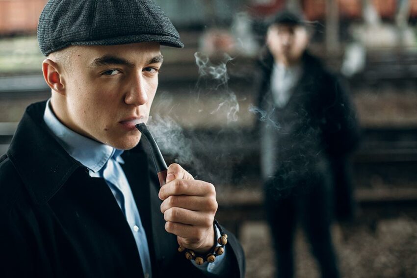 Plagiarism detection concept - a detective smoking a pipe